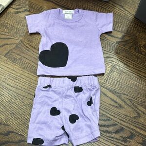 Purple short sleeve with hearts and shorts